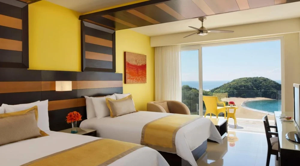 Preferred Club Junior Suite with Two Double Beds Ocean Front at Secrets Huatulco Resort & Spa