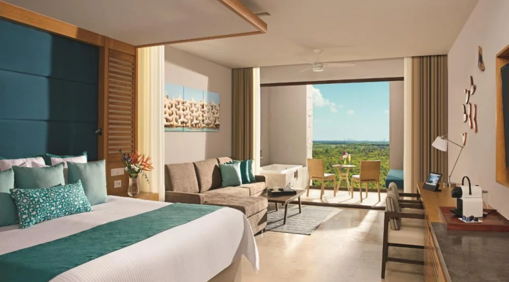 Junior Suite Garden View - Two Queen Beds at Dreams Playa Mujeres Golf & Spa Resort