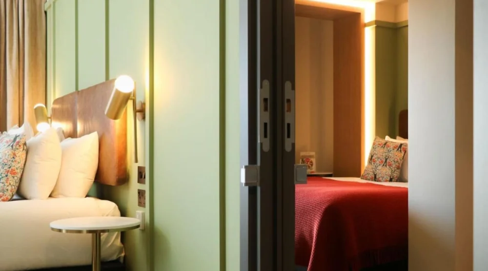 Two Bedroom Connecting Family Room with Water View at The Reach at Piccadilly, a Tribute Portfolio Hotel