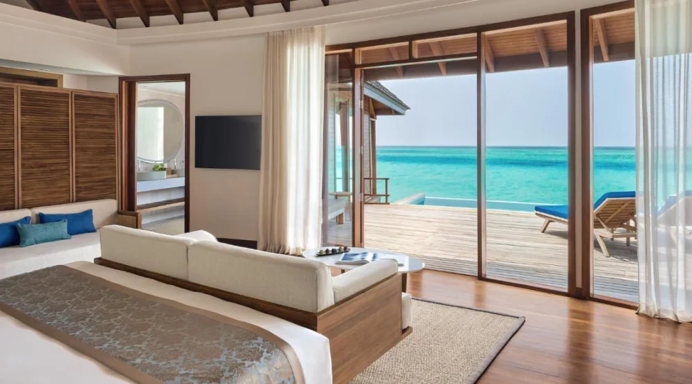 Sunset Over Water Pool Villa at Anantara Dhigu Maldives Resort