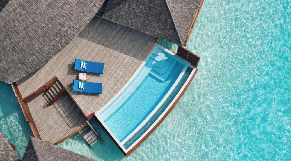 Deluxe Sunset Over Water Pool Villa at Anantara Dhigu Maldives Resort