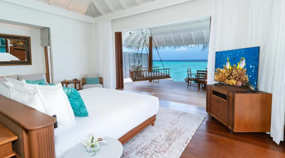 Sunset Over Water Pool Villa at Anantara Kihavah Maldives Villas