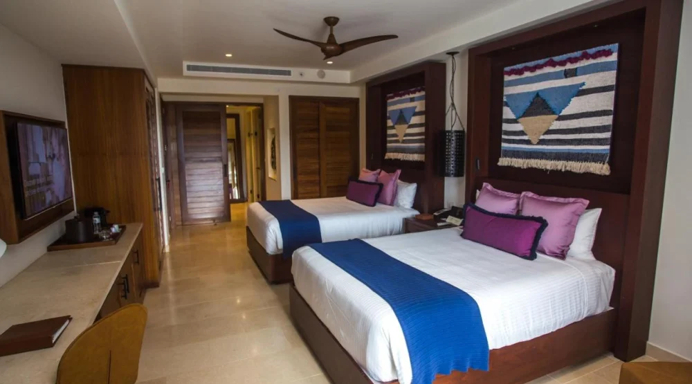 Junior Suite Partial Ocean View with Double Beds (2 Adults) at Secrets Cap Cana Resort & Spa