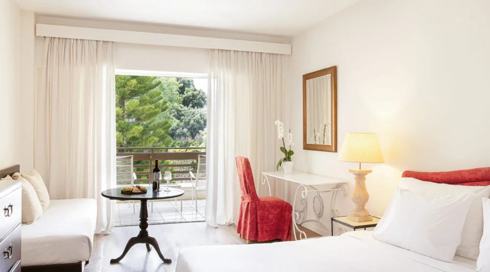 Superior Room Garden View & Private Balcony at Grecotel Lux Me Daphnila Bay Dassia