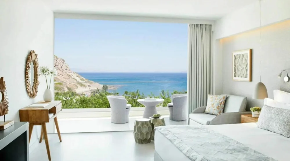 Superior Triple Room with Side Sea View at Ikos Aria