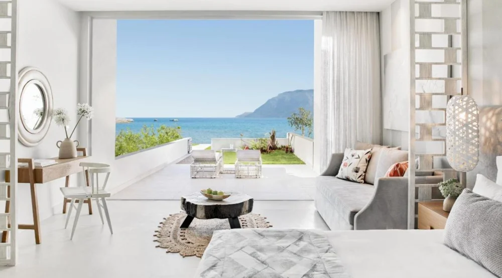Deluxe Junior Suite with Private Garden and Sea View at Ikos Aria