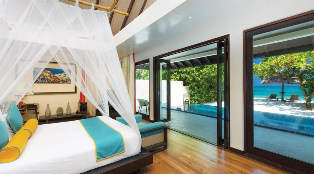 Sunset Beach Villa with Pool at Atmosphere Kanifushi Maldives