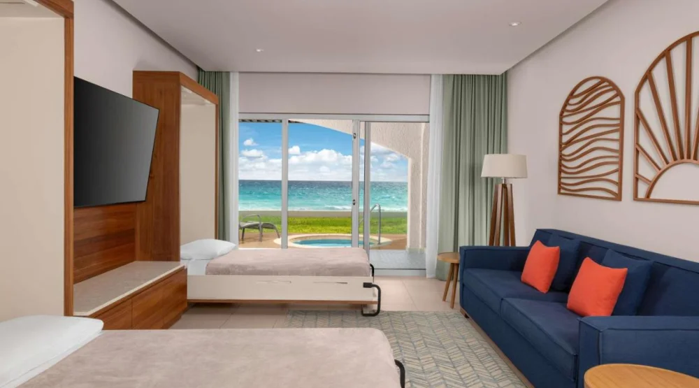 Enclave Beachfront King Room with Two Murphy Beds at Hilton Cancun Mar Caribe All-Inclusive Resort