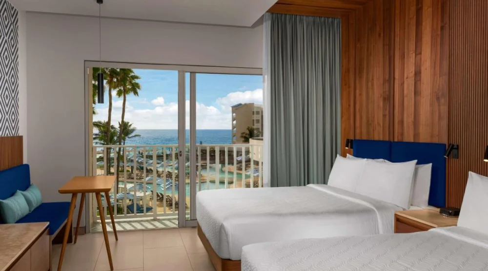 Queen Room with Two Queen Beds and Ocean View at Hilton Cancun Mar Caribe All-Inclusive Resort