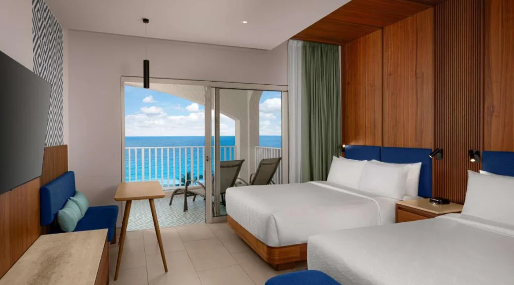 Premium Queen Room with Two Queen Beds and Ocean View at Hilton Cancun Mar Caribe All-Inclusive Resort