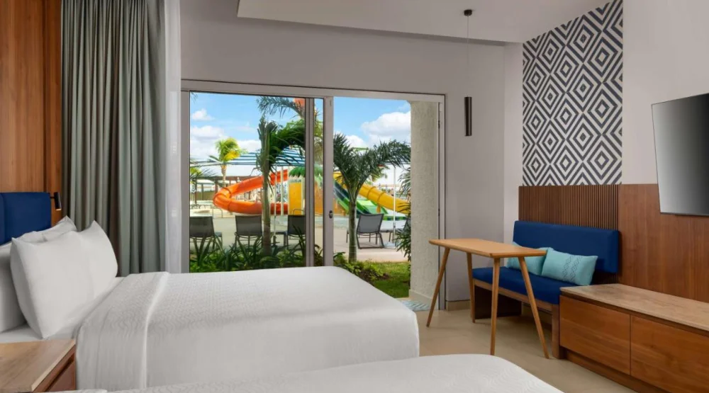 Queen Room with Two Queen Beds Pool - Patio at Hilton Cancun Mar Caribe All-Inclusive Resort