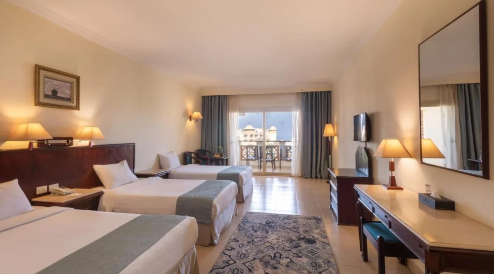 Family Room with Garden View ( Two Adults + Two Children ) at Serenity Alpha Beach