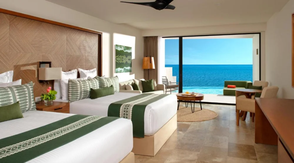 Double Junior Suite with Swim-out and Ocean Front View at Dreams Sapphire Resort & Spa