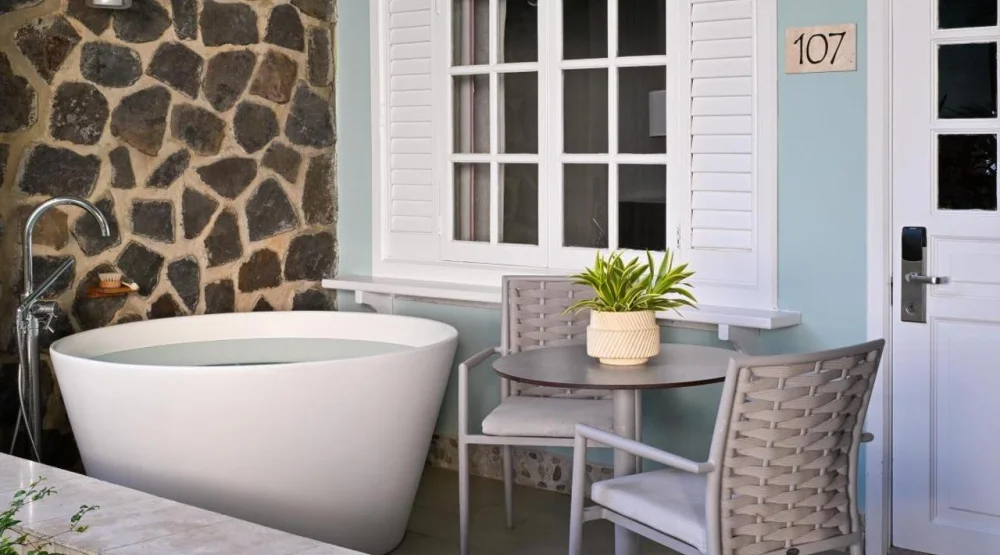 Grand Luxe Club Level Walkout Room with Patio Tranquility Soaking Tub at Sandals Halcyon Beach