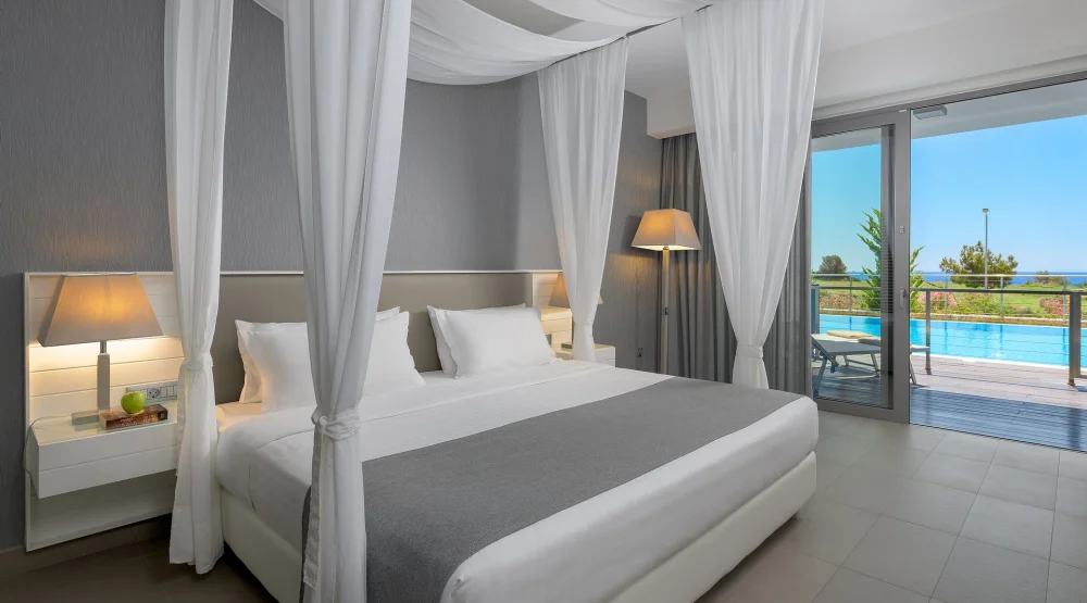 Junior Suite Sharing Pool Sea View at Princess Andriana Resort & Spa