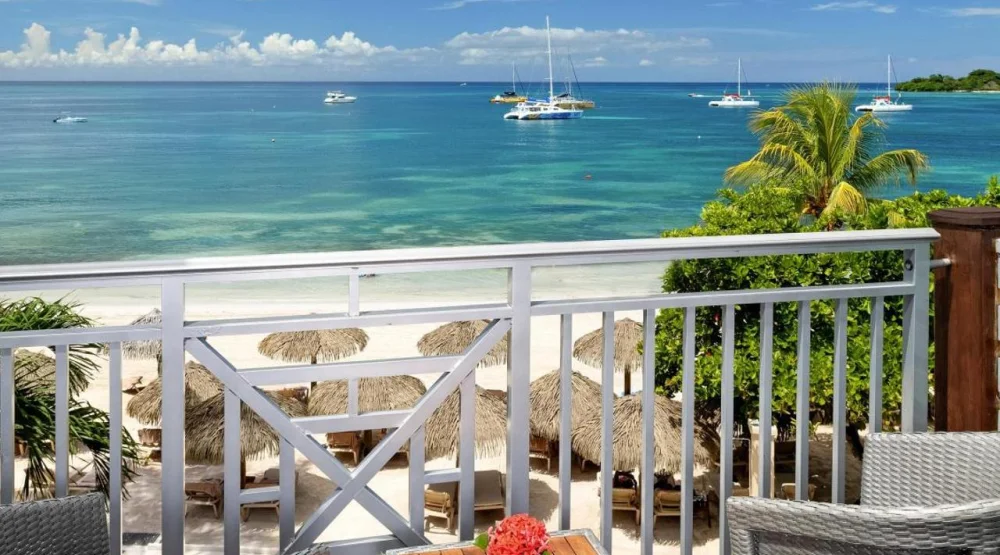 Paradise Honeymoon Beachfront Grande Luxe Club Level Room at Sandals Negril
