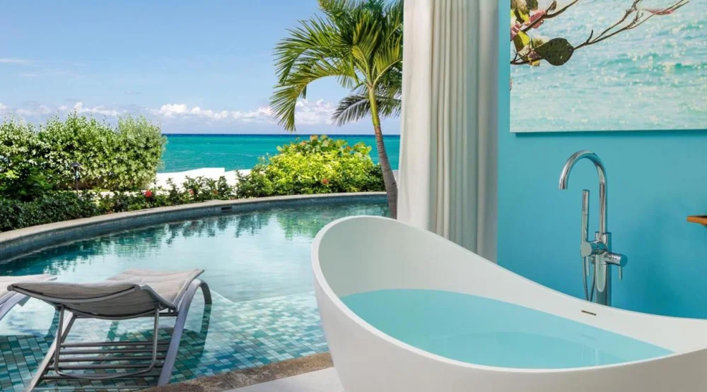 Oceanfront Swim-up Butler Suite with Patio Tranquility Soaking Tub at Sandals Montego Bay