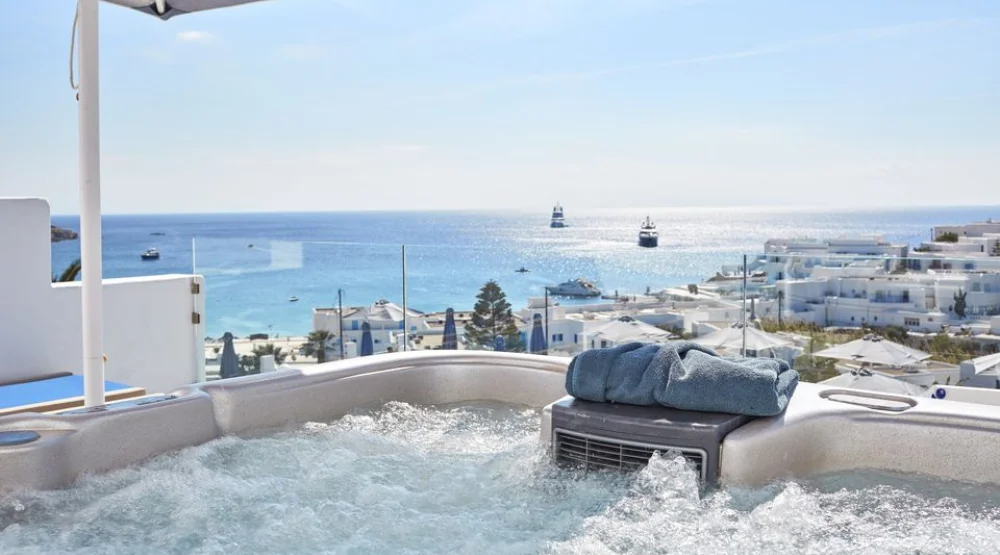 Azure Suite with Private Jacuzzi & Sea View at Myconian Ambassador Relais & Chateaux Hotel