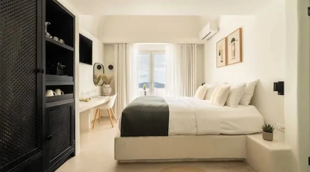 Deluxe Room Caldera View Quadruple at Rocabella Santorini Hotel & Spa