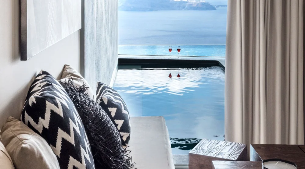 Royal Suite with Indoor Or Outdoor Plunge Pool and Caldera View at West East Suites