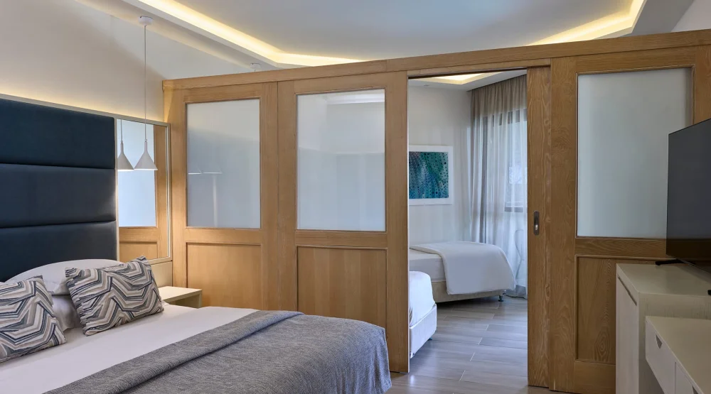 Family Room Sliding Door Swim Up Inland View at Atlantica Aegean Blue