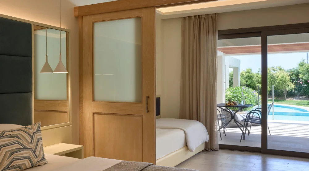 Premium Family Room Sliding Door Swim Up Inland View at Atlantica Aegean Blue