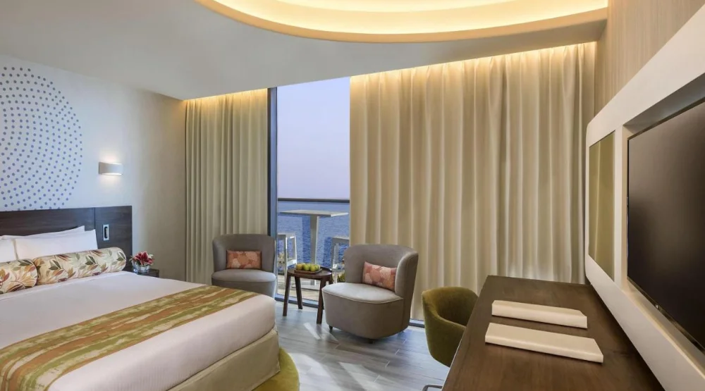 Deluxe Room with Balcony and Partial Sea View at The Retreat Palm Dubai MGallery by Sofitel