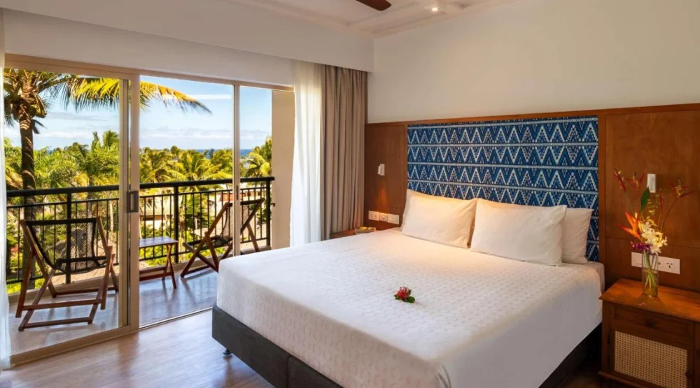 One Bedroom Suite One King Bed at Outrigger Fiji Beach Resort
