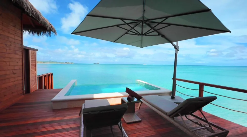 Chairman Sunset Overwater Bungalow Two Bedroom Suite Diamond Club at Royalton Chic Antigua Autograph Collection