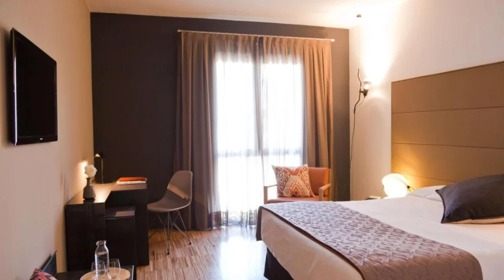 Classic King Room at Alexandra Barcelona Hotel Curio Collection by Hilton