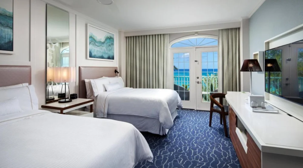 Ocean Pool, Guest Room, Two Double, Sofa Bed, Pool View at The Westin Grand Cayman Seven Mile Beach Resort