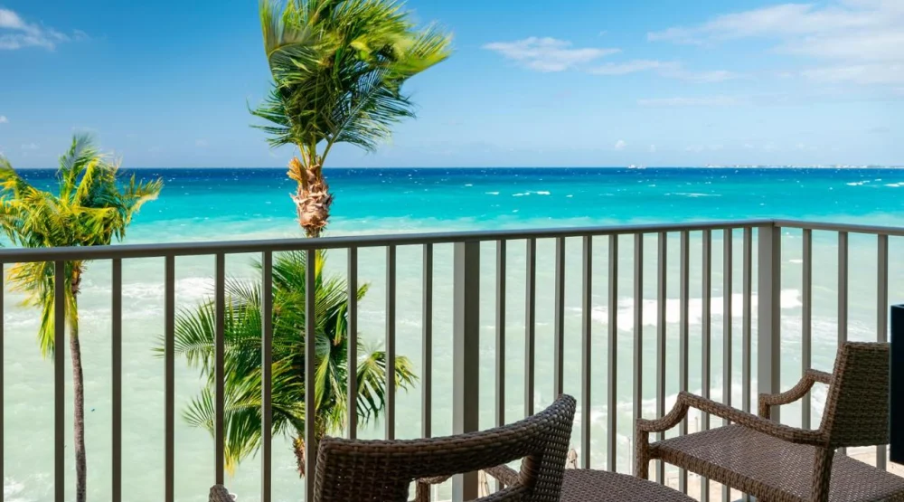 King Room with Oceanfront View and Balcony at Grand Cayman Marriott Resort