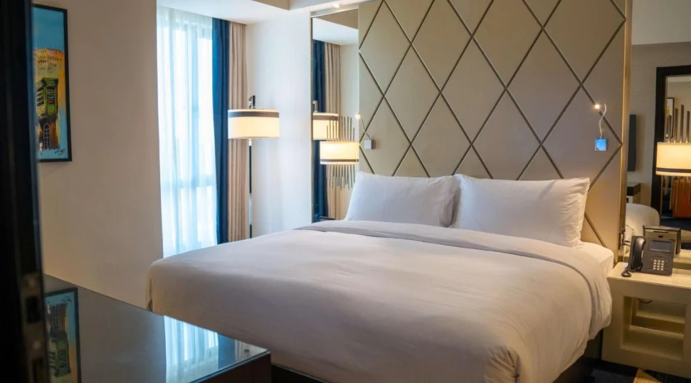 Two Bedroom Suite with One King and Two Twin Beds at Hilton Amman