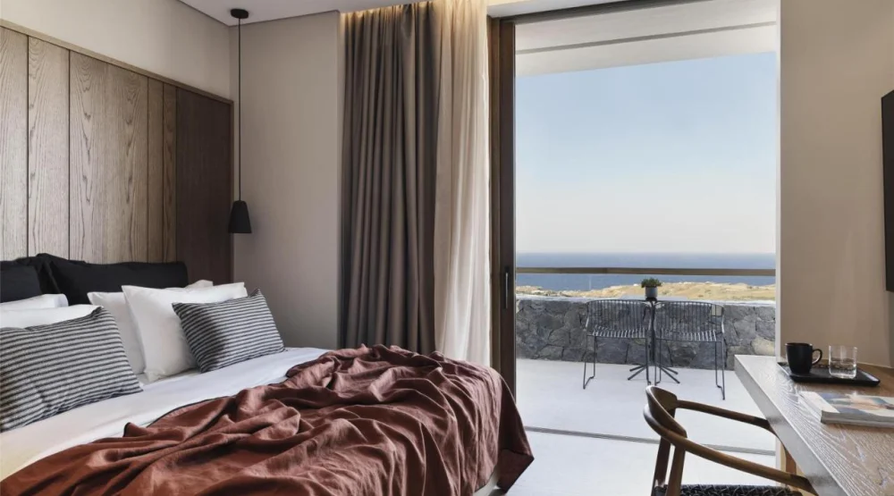 Junior Suite with Hot Tub and Sea View at Magma Resort Santorini