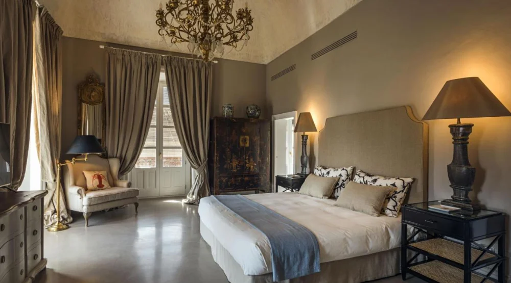 King Suite with Balcony at Seven Rooms Villadorata
