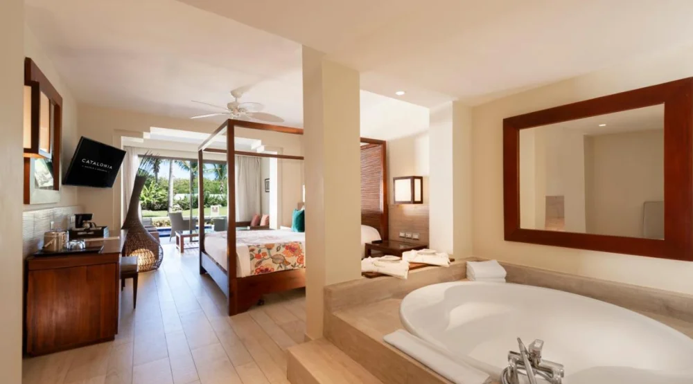 Deluxe Junior Suite & Swimming Pool at Catalonia Royal Bavaro Hotel