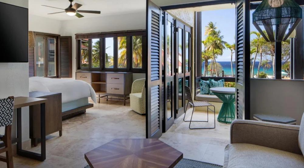 Junior Suite with Two Double Beds with Sofa Bed, Kitchenette and Ocean View at Carambola Beach Resort St. Croix