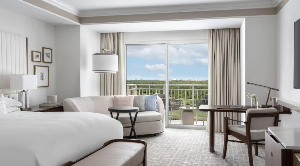 Lakefront King Room with Sofa Bed and Pool View at The Ritz-Carlton Orlando Grande Lakes