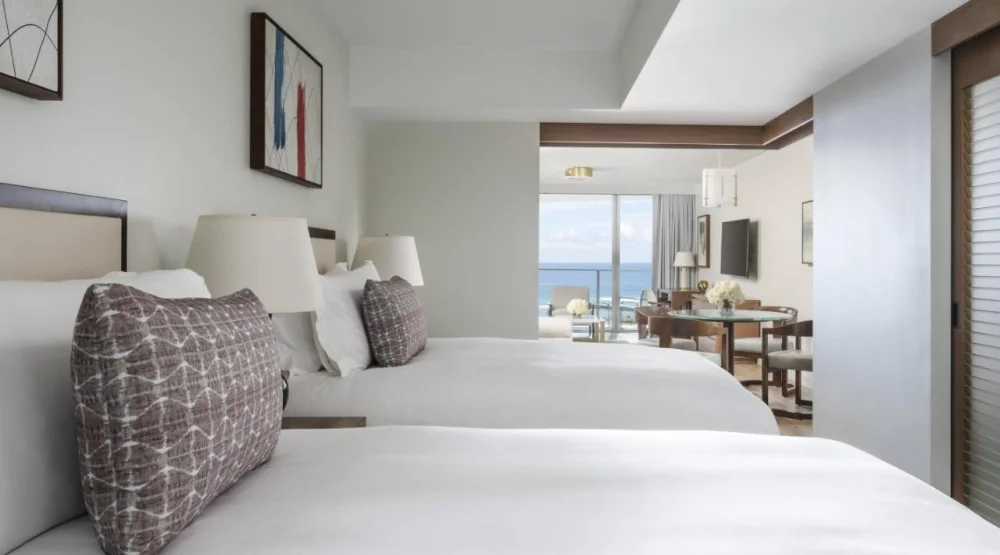 Deluxe One Bedroom Suite with Two Double Beds and Ocean View at The Ritz-Carlton Residences Waikiki Beach