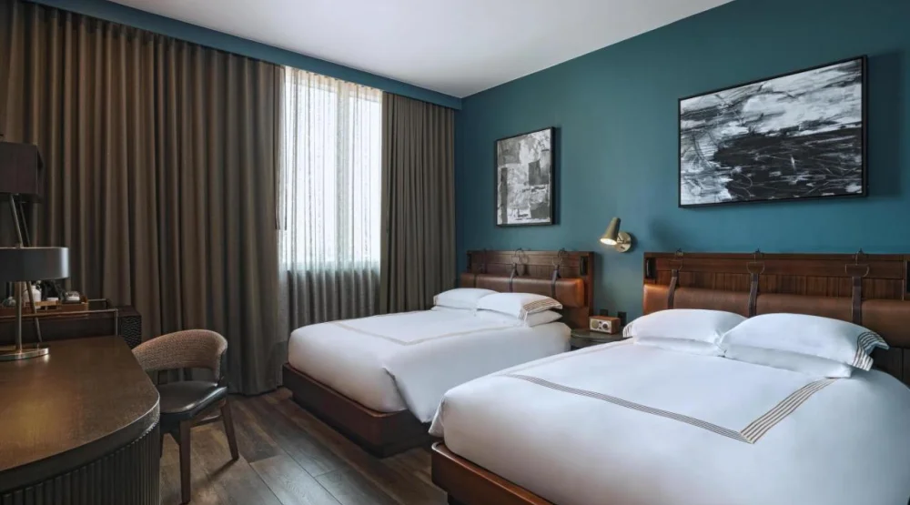 Queen Room with Two Queen Beds and City View at Thompson San Antonio Riverwalk