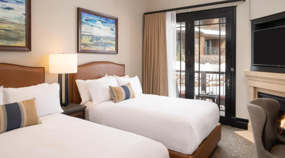 Queen Guest Room with Two Queen Beds and Fireplace at Waldorf Astoria Park City