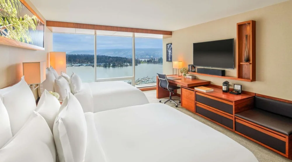 Signature Harbor and Mountain View Room with Two Queen Beds at Fairmont Pacific Rim