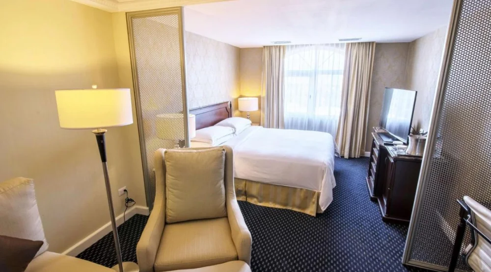 Junior King Suite with Seating Area at Hilton Princess Managua