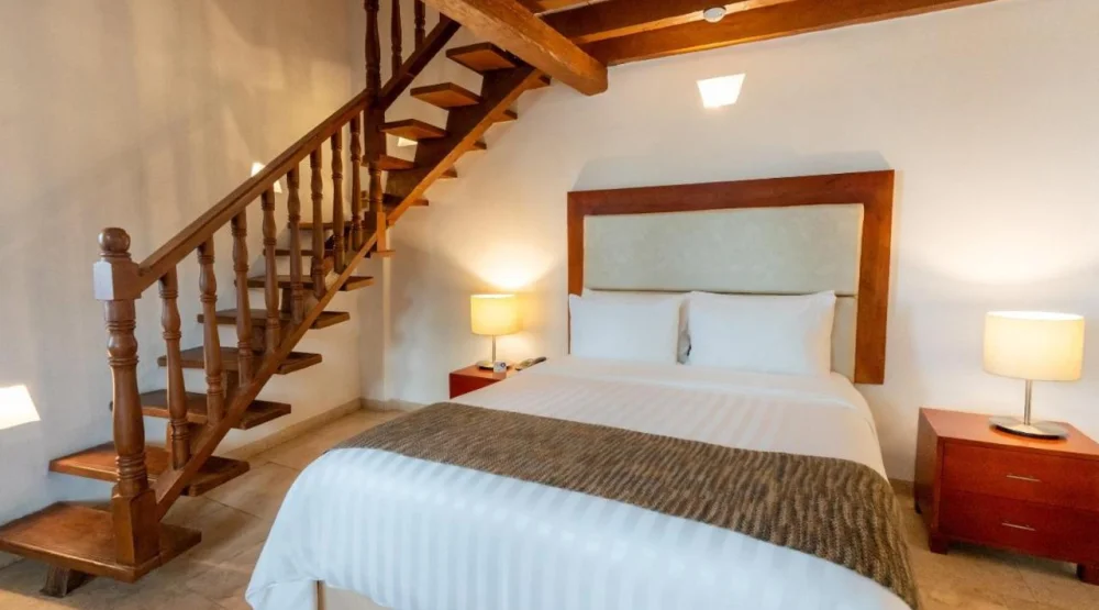 Duplex Quadruple Room at GHL Collection Armeria Real Hotel