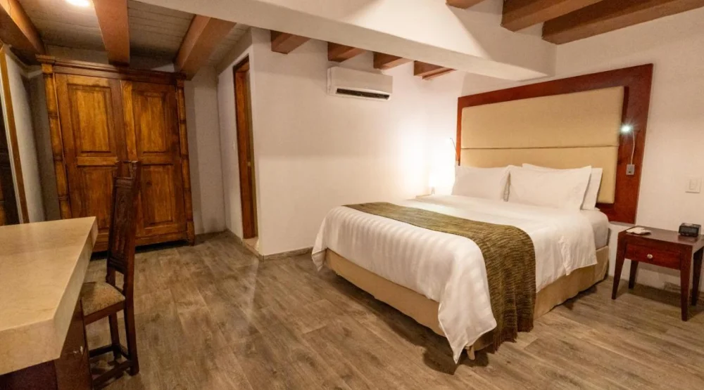 Duplex Quadruple Room at GHL Collection Armeria Real Hotel