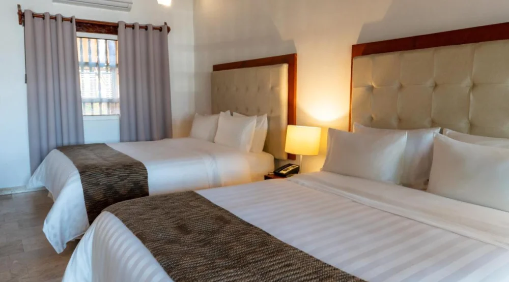 Superior Quadruple Room at GHL Collection Armeria Real Hotel