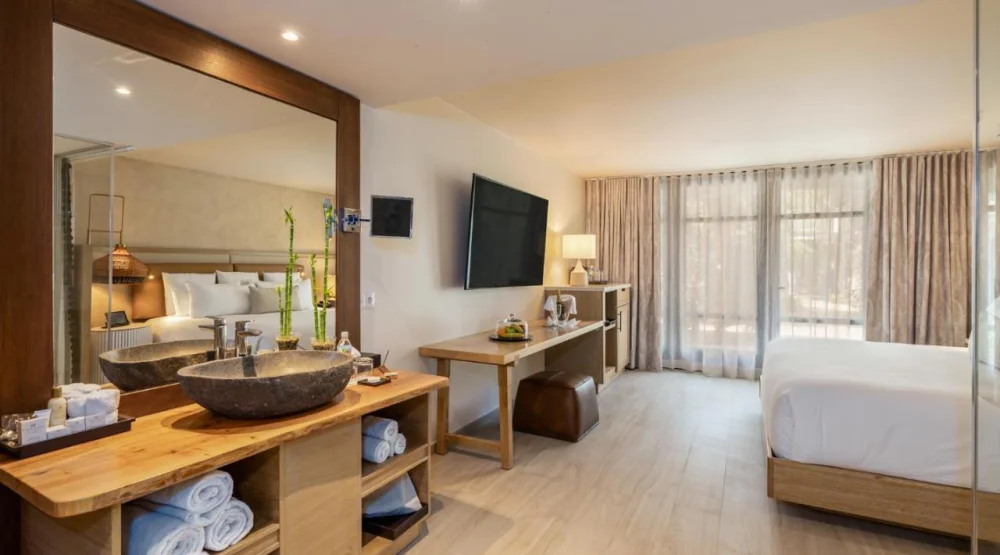 Junior Suite with Pool View King Beds at Zoetry Curacao Resort & Spa