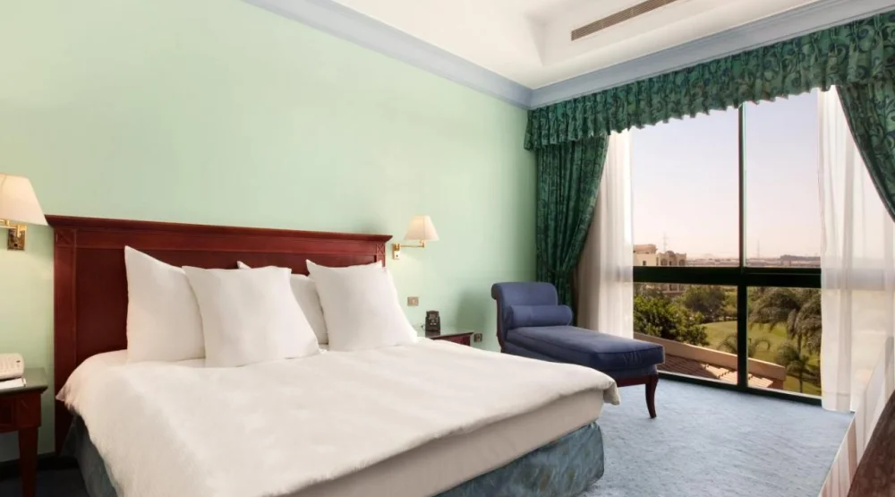 Deluxe King Room with Kitchenette at Hilton Pyramids Golf