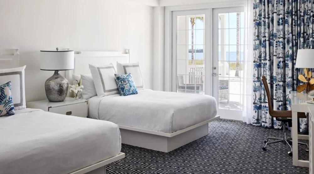 Oceanfront Veranda Two Bedroom Guestroom, Two Queens Primary/ One King Room at Isla Bella Beach Resort