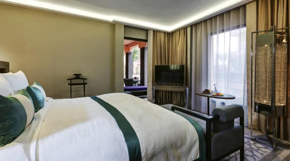 Prestige King Suite with Living  Room and Sofa at Movenpick Hotel Mansour Eddahbi